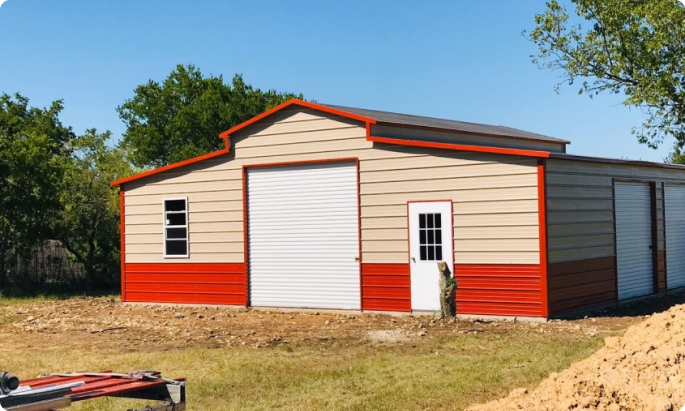 two tone metal building with leanto