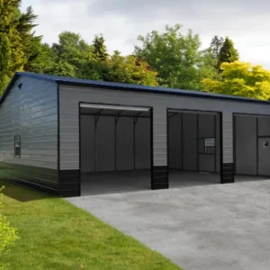 A 24X40X12 Vertical Roof Metal Garage with two doors in the middle of a yard.