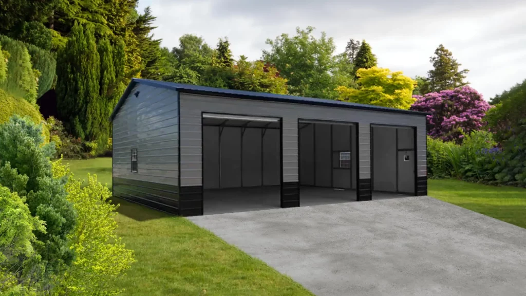 A 24X40X12 Vertical Roof Metal Garage with two doors in the middle of a yard.