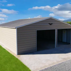 A 28X30X9 Vertical Roof Metal Garage with a door in the middle of a grassy field.